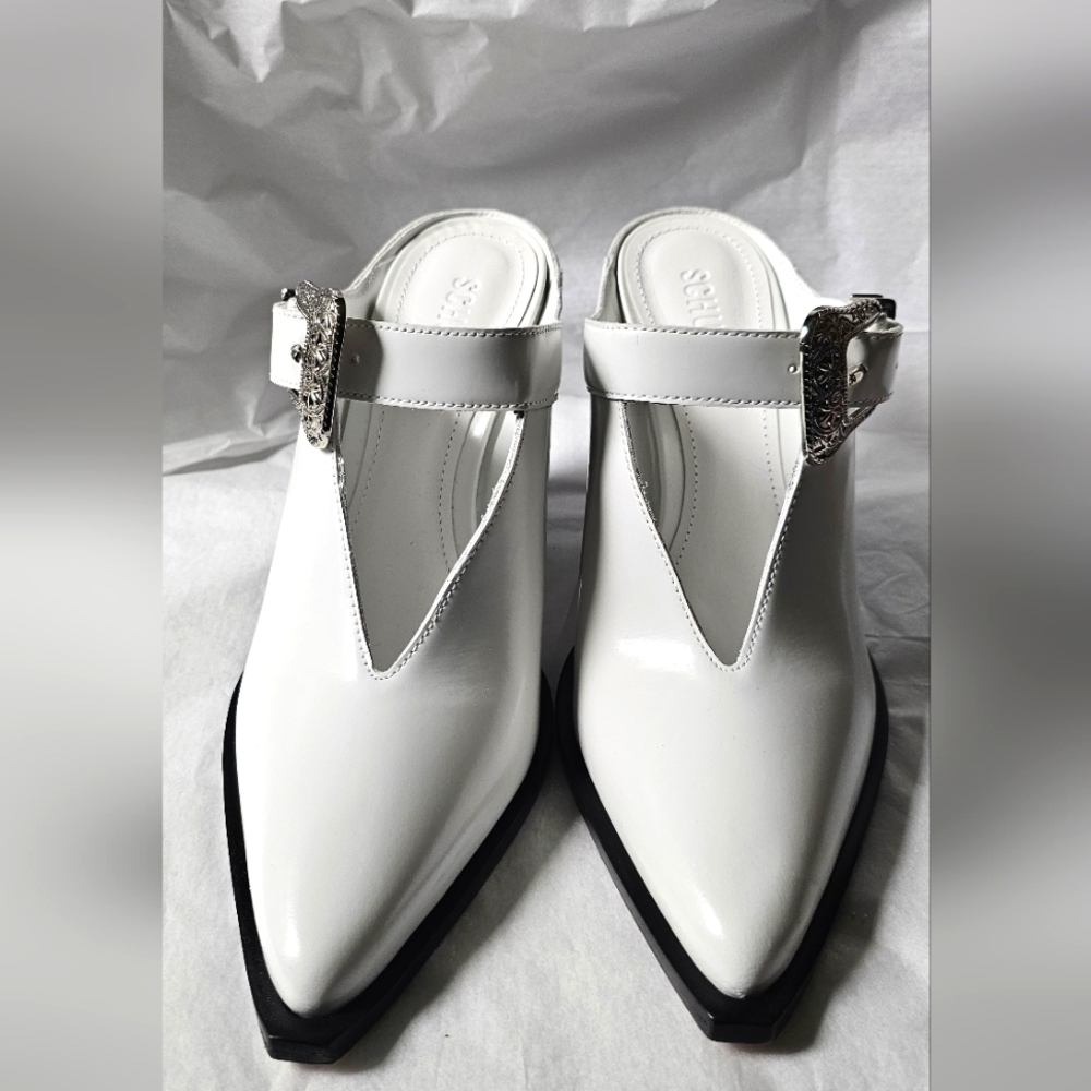 SCHUTZ White and Silver Mules with T-Strap Design.